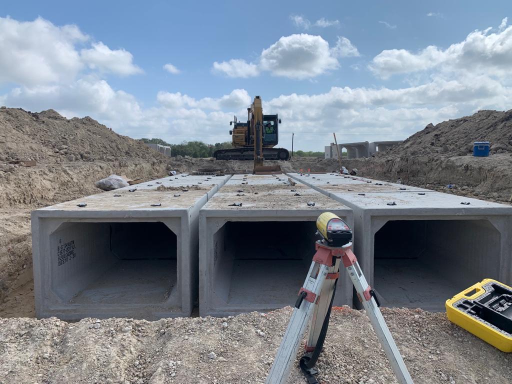 Multi-cell box culvert being installed in an excavation