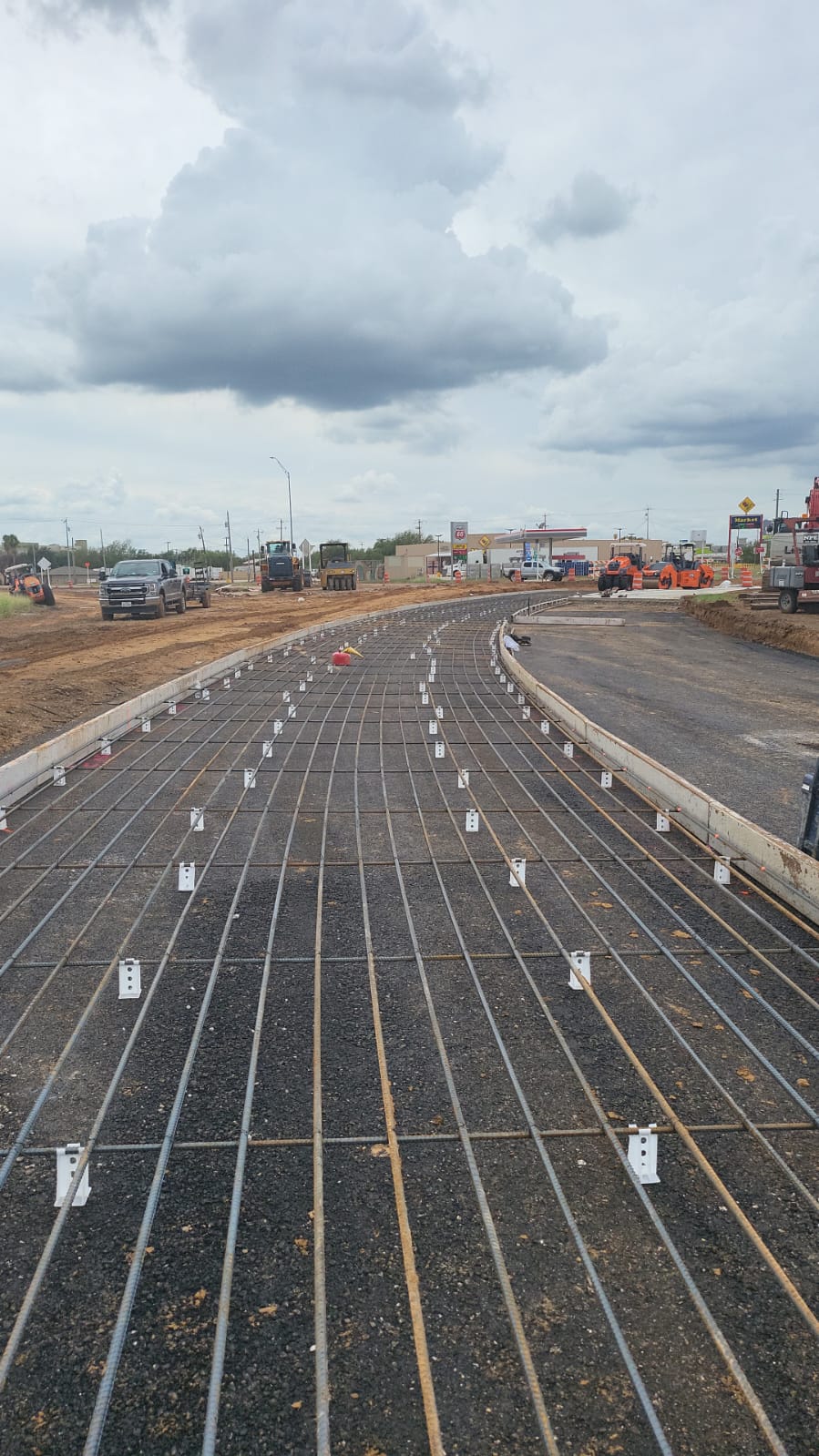 Reinforcing steel prepared for a concrete roadway placement